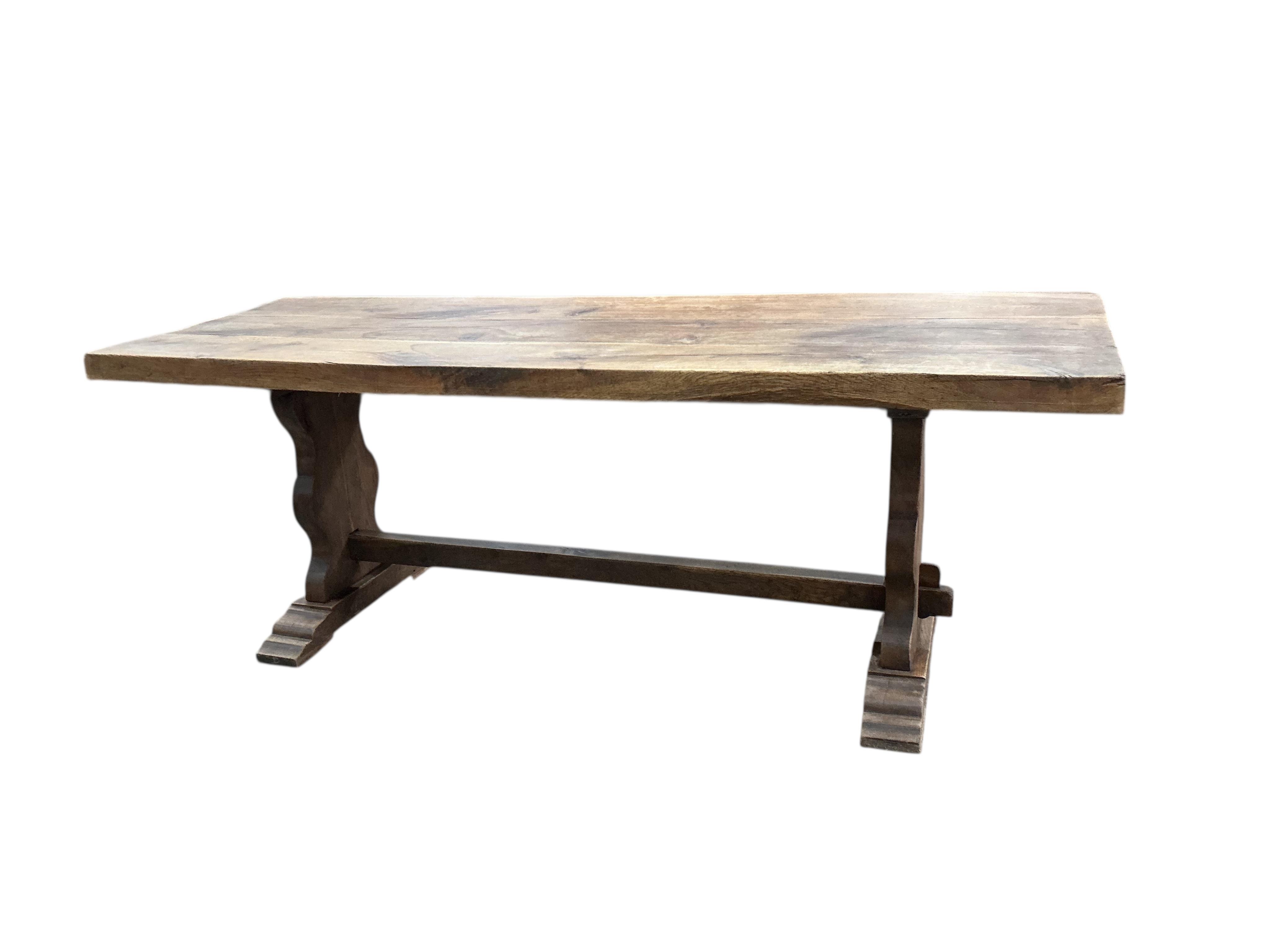 An 18th century style rectangular oak refectory dining table, width 214cm, depth 72cm, height 78cm